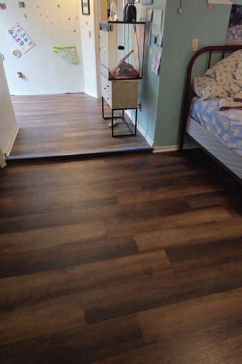 Luxury vinyl plank flooring in a bedroom